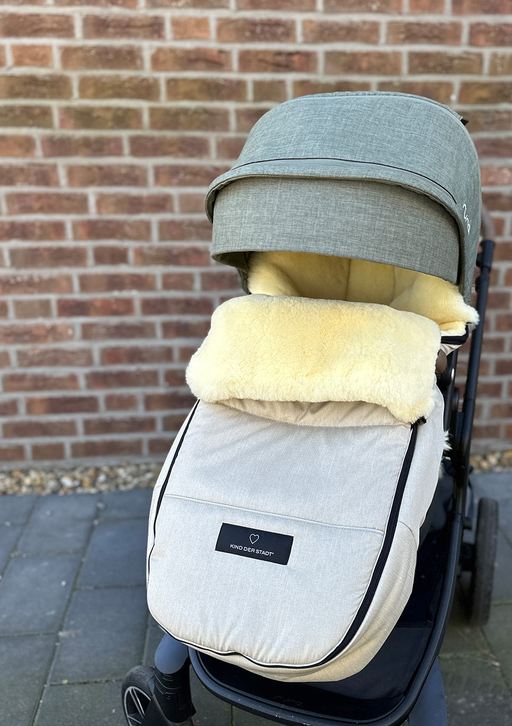 Premium Lammfell-Fußsack Limited Edition dune-beige